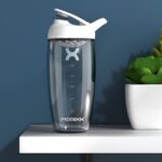 "Ultimate Protein Powerhouse: Promixx PURSUIT Gym Protein Shaker Bottle - Unleash Your Fitness Potential with Premium Sports Blender Bottles for Delicious Protein Mixes and Supplement Shakes - Effortless Cleaning, Unbreakable Protein Shaker Cup"