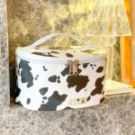 "Cow Print Waterproof Makeup Bag - Stylish and Compact Cosmetic Organizer for Women"